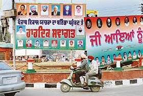 A view of Vikas Yatra hoardings put up at Fauji Chowk in Bathinda