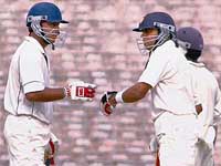 North Zones Ravneet Ricky (left) and Aakash Chopra congratulate each other on the second day of the Duleep Trophy final against Sri Lanka A in Kolkata on Monday. 