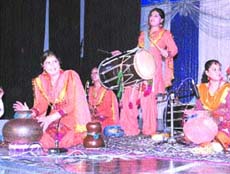 Students of the BBK DAV College For Women play traditional instruments