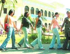 Students of Guru Nanak Dev University pass by the Summer Palace of Maharaj Ranjit Singh