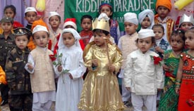 Kiddies Paradise School pose as various characters to celebrate Childrens Day in Ludhiana on Tuesday