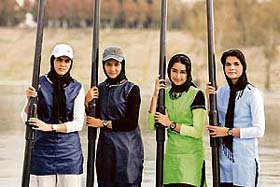 Iranian womens rowing team members (left to right) Sahra Zlqadr, Saba Shaiesteh, Minoo Zargqri, and Mina Amini, pose during a training session for the Doha Asian Games in Tehran