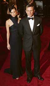 Actor Daniel Craig arrives with a guest for the world premiere of the latest James Bond move Casino Royale at a cinema in London