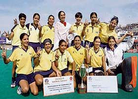 Northern Railway team pose with the trophy after winning the womens section of the 10th Indian Oil Surjit Hockey Tournament in Jalandhar