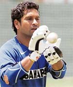 Sachin Tendulkar takes a catch during a practice session in Benoni, Johannesburg