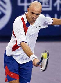 Croatias Ivan Ljubicic in action against Argentinas David Nalbandian at the Tennis Masters Cup in Shanghai