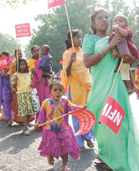 Women marching to Parliament to demand passage of the Womens Reservation Bill in the ongoing winter session. 
