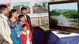 A family goes round the technical exhibition organised as part of the 67th session of the Indian Roads Congress
