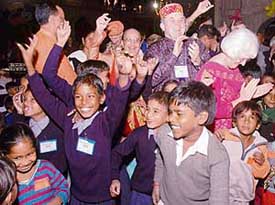 Children from Bapu Dham, Mauli Jagran and Uchai have the time of their lives at a party organised for them by Rotary International at the Rock Garden in Chandigarh on Saturday. Also seen in the background are Rotarians from the Rotary International swinging with them.