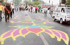 Rangolis dot the road to welcome the Jagannath Yatra