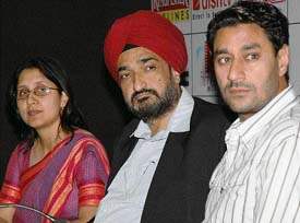 Chief Secretary, Goa, J.P. Singh (centre), with Nandini Paliwal, CEO of Entertainment Society of Goa, and Punjabi folk singer Harbhajan Mann