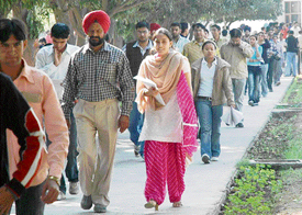 MBA aspirants come out of Guru Gobind Singh College, Sector 26, Chandigarh, after appearing in the Common Admission Test (CAT) for admission to top business schools