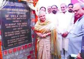 Delhi Chief Minister Sheila Dikshit laying foundation stone of the 2nd phase of the Rajiv Gandhi Cost Effective Housing Complex in the Capital on Sunday.