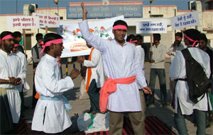 To mark the anniversary of Bharat Sanchar Divas students of Trinity College and volunteers of Sat Sewa Sanchar present a Nukar Natak on drug abuse and AIDS in front of railway station in Jalandhar on Sunday.