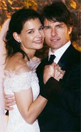 Actor Tom Cruise and Katie Holmes pose for their official wedding portrait in Lake Braccino, Italy, on Saturday.