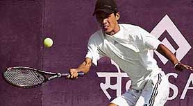 A player in action during the AITA Talent Series Tennis Tournament at the CLTA courts 