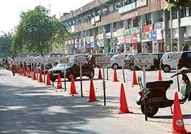 Road cones at the Sector 35 market parking in Chandigarh on Monday. 