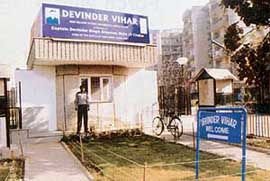 A glow board at the entrance of Devinder Vihar in Gurgaon