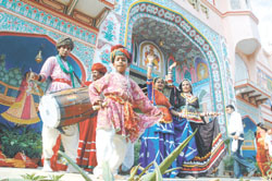 Traditional artistes performing in front of Rajasthan pavilion at IITF 2006 in the Capital
