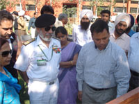 Deputy Commissioner Alok Shekhar with Defence Ministry officials at Birla farm in Ropar, on Monday.