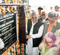 Haryana CM Bhupinder Singh Hooda inaugurates the Bansi Lal Cricket Stadium at Lahli village in Rohtak district on Monday
