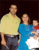 Mihir with his proud parents at the ICICI Cutest Baby contest