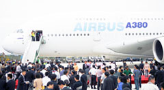 Chinese officials and guests gather around the new Airbus superjumbo A380, which landed at Guangzhou Baiyun airport, the first stop on mainland China