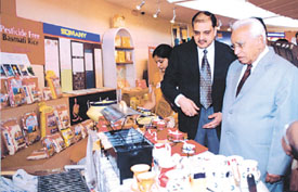 Haryana Governor A.R. Kidwai looking at the items on display at Haryana Pavilion in IITF-2006 in the Capital on Wednesday.