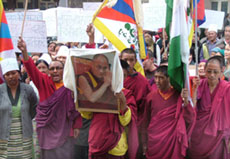 Tibetans protest against the visit of Chinese President Hu Jintao in Mandi on Wednesday. 