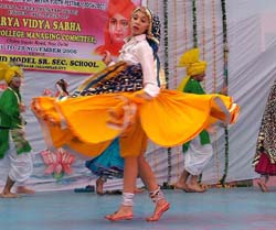 Participants perform a folk dance during the All India Mahatma Hans Raj Aryan Youth Festival in Dayanand Model Senior Secondary School, Jalandhar. 