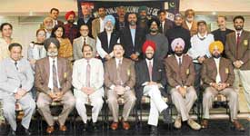 PGA delegates, who will visit Pakistan to play golf in Lahore, pose for a photograph