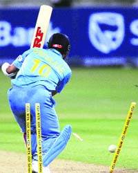 Sachin Tendulkar is bowled by South Africas Andre Nel during the second ODI in Durban