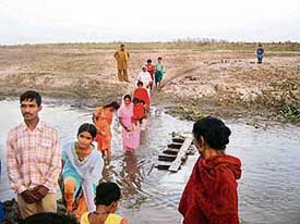Families belonging to Chandiwala and Julloke villages cross the Sutlej. 