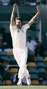 Australias Glenn McGrath celebrates after taking the wicket of Englands Alastair Cook during the first Ashes Test in Brisbane on Friday