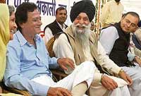 Leaders of the BJP-SAD-CVM alliance  Harmohan Dhawan, Capt Kanwaljit Singh and Arun Jaitley  share a light moment during a rally in Chandigarh on Sunday.