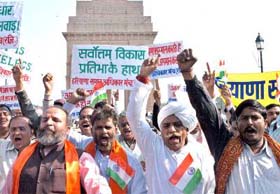 Activists of the Rashtriya Sainik Morcha and the Haryana Saman Adhikar Manch demonstrate against reservation policy at India Gate, New Delhi