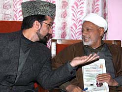 Hurriyat Conference chairman Mirwaiz Umer Farooq (left) with senior leader Maulana Abbas Ansari at meeting in Srinagar on Thursday. 