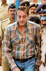 Bollywood actor Sanjay Dutt comes out of the special TADA court after submitting his plea for a lenient sentence for his conviction under the Arms Act in Mumbai on Thursday