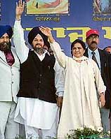 BSP chief Mayawati waves at a gathering at Tajpur village, near Jalandhar, on Thursday.
