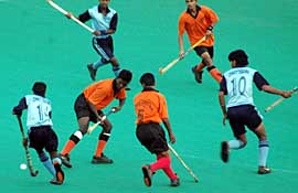 The hockey match between Chhattisgarh and Maharashtra in progress at the Sector 42 stadium during the 52nd National School Games.