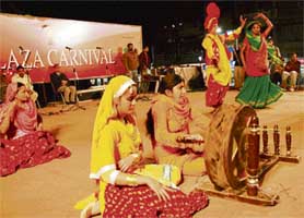 Disabled children from Engineering College, Sector 26, perform bhangra at the Plaza Carnival in Sector 7, Chandigarh, on Saturday. The carnival was sponsored by The Tribune.