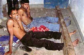Third-degree treatment being meted out to suspected criminals at the CIA staff centre in Batala