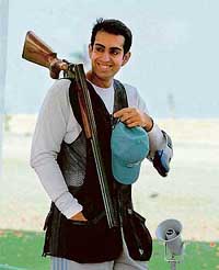 Manavjit Singh Sandhu is all smiles after posting a good score in the trap event in Doha on Saturday. 