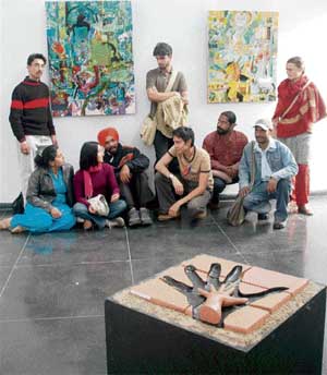 Artists of 'Flux Asia' come together for an exhibition of their works at the Fine Arts Museum at Panjab University in the city on Tuesday. 