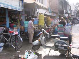 Shops stretched to the roadside in the Grain Market of Phagwara. 