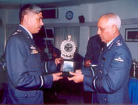 Air Commodore Inder Singh, Air Officer Commanding, Air Force Station, Adampur, receives the Best Administrative Wing trophy from Air Chief Marshal S.P. Tyagi during the recently held commanders conference 
