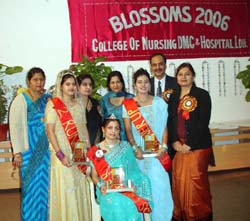Winners of Miss Fresher contest, along with other participants, at the freshers party of DMCH College of Nursing in Ludhiana