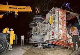 A view of the truck that overturned on a car, killing its five occupants, near Jodhpur Romana village in Bathinda on Wednesday night.