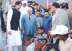 Governor of Haryana A. R. Kidwai is accompanied by MP from Rohtak Deepinder Singh Hooda at the launch ceremony of Healthy Haryana campaign in Mewat on Saturday