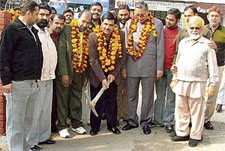 Mr Madan Lal Bagga, councillor of Ward No. 4, inaugurates a street metalling project at Shanker Puri in Ludhiana on Saturday.